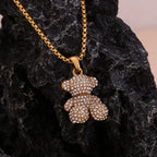 E.B.belle Colar com pingente de urso sentado, resistente à água, banhado a ouro 18K, aço inoxidável 316L